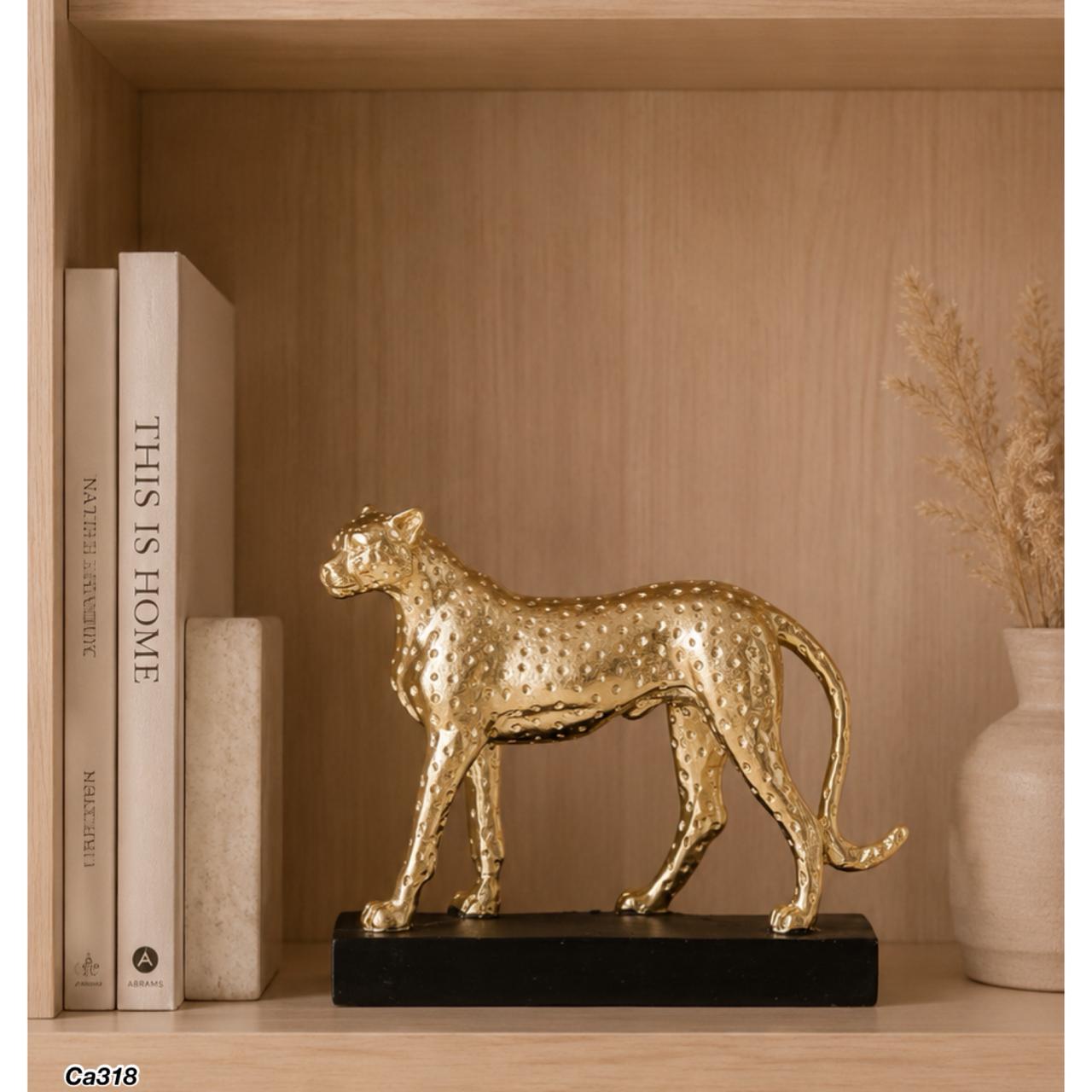 Articulo decorativo leopardo dorado base negro resina 18cm* 6cm* 15cm